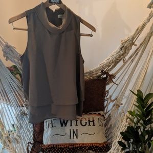 Nude sleeveless blouse